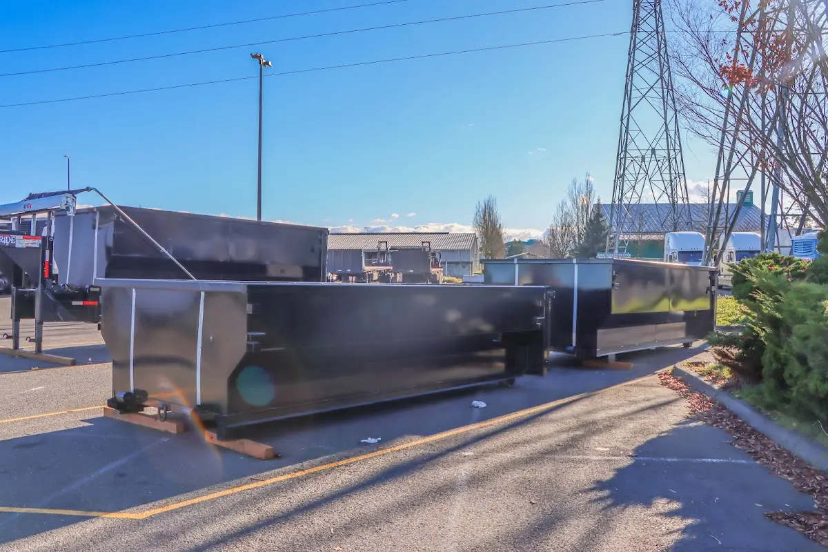 Roll-off dumpster ready for waste disposal at job site for Commercial Dumpster Rental in Hillsdale